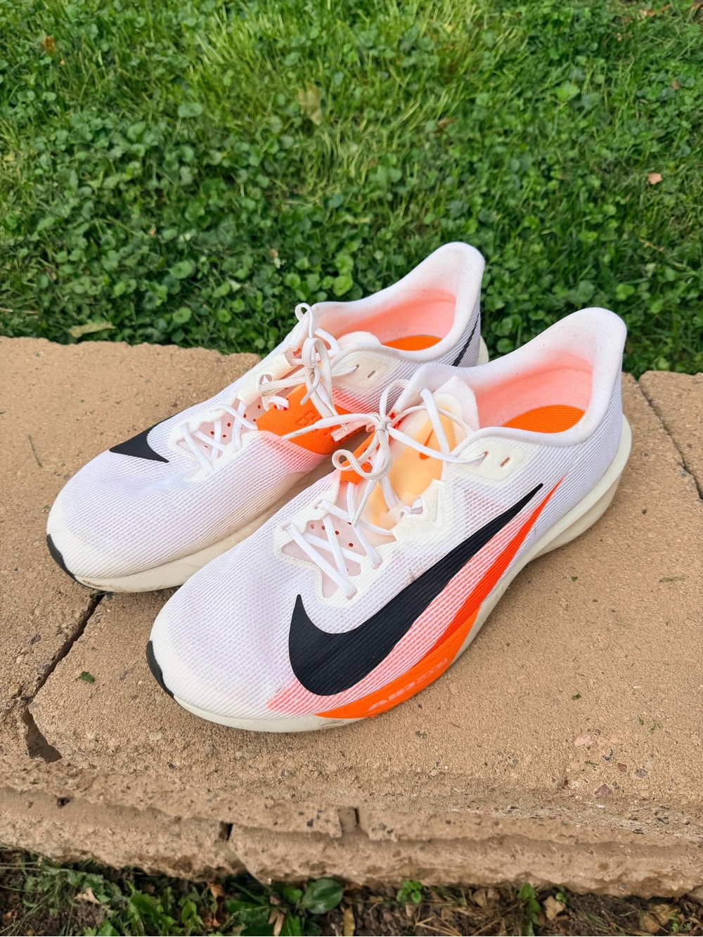 Men’s Nike White and Orange Athletic Running Shoes with Black Swoosh